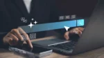 Person using a laptop and smartphone with AI search graphics