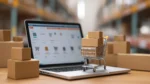 Mini shopping cart with packages on a laptop in an ecommerce warehouse