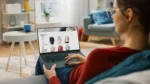 Shopper browsing an online clothing store on a laptop at home